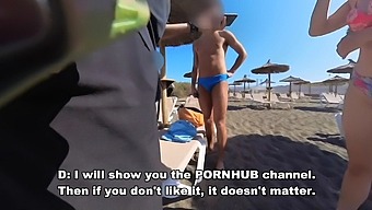 A Young Naturist Woman Gives A Blowjob To A Stranger On The Beach, Watched By Old Voyeuristic Men